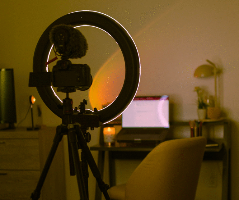 A camera with a ring light preparing for content creation.